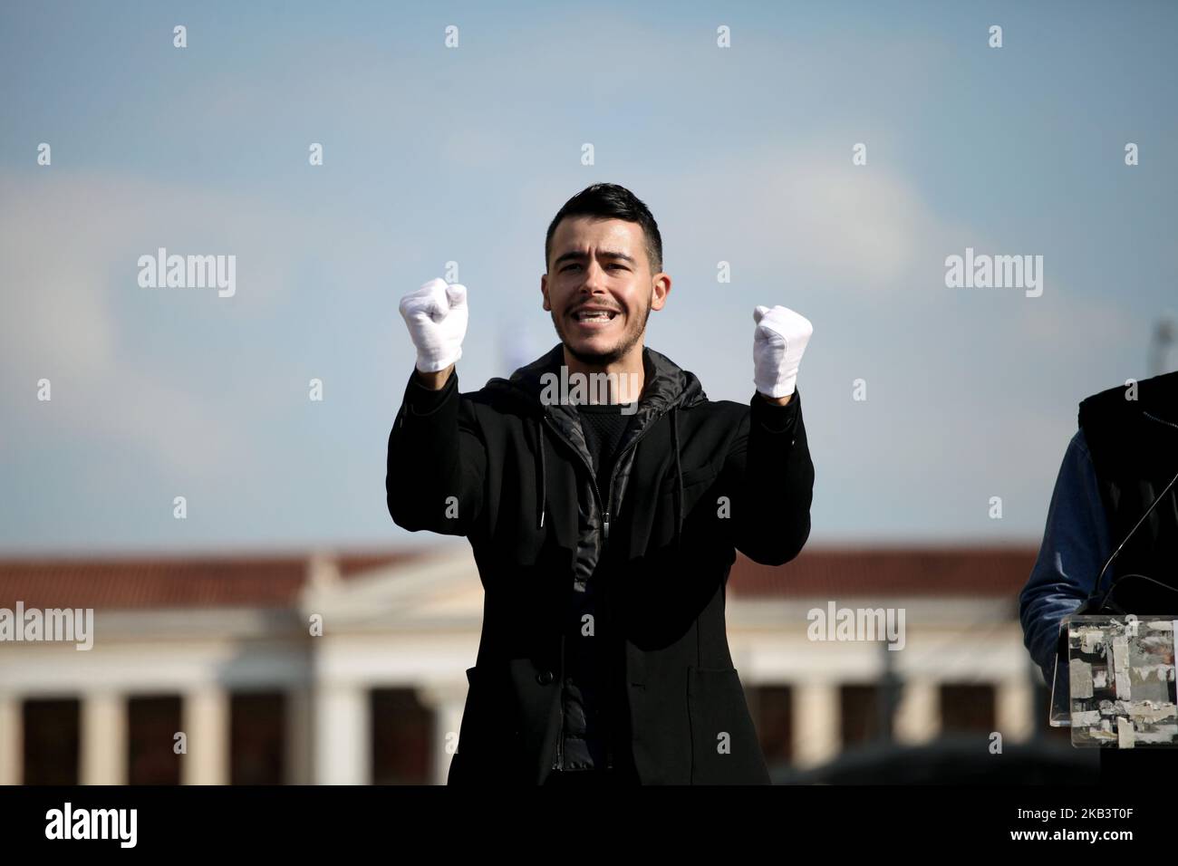 Protesters wear white gloves and use sign language during a protest for disabled rights on the occasion of the International Day for Persons with Disabilities in Athens, Greece on December 3, 2018. Protesters demand wage and social welfare since they have been eliminated by years of austerity measures. (Photo by Giorgos Georgiou/NurPhoto) Stock Photo