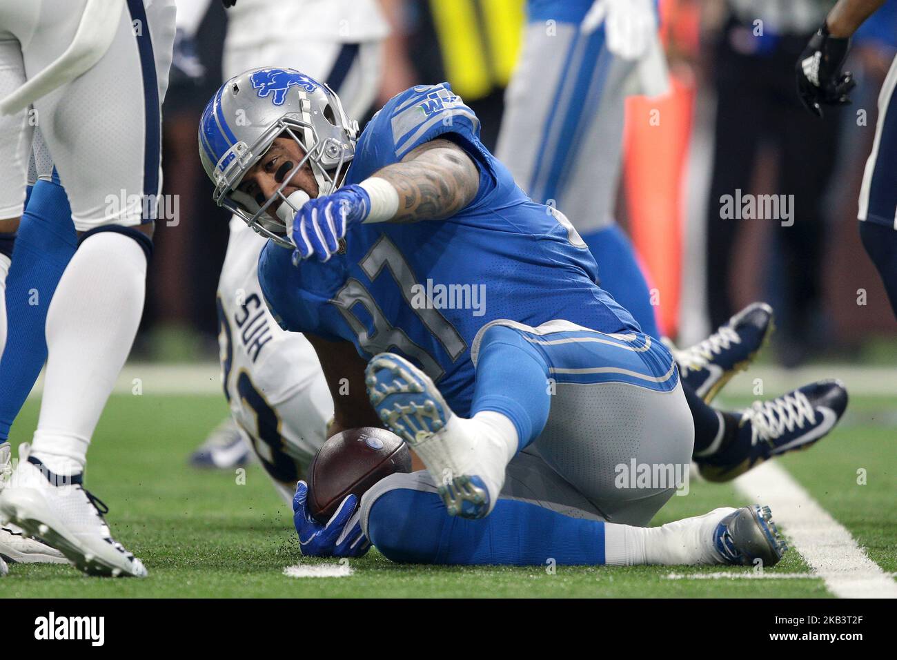 Detroit Lions tight end Levine Toilolo #87 looks on from the sidelines  during the second half of an NFL football game against the New England  Patriots in Detroit, Michigan USA, on Sunday