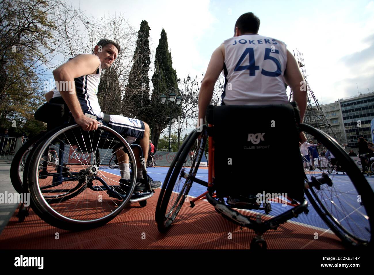 Wheelchair Basketball at Syntagma Square in Athens, Greece on December 3, 2018 on the occasion of the International Day for Persons with Disabilities. The unprofessional tournament was organised by the Hellenic Wheelchair Basketball Federation and gave people not physically disabled the opportunity to try the wheelchair and play basketball. (Photo by Giorgos Georgiou/NurPhoto) Stock Photo