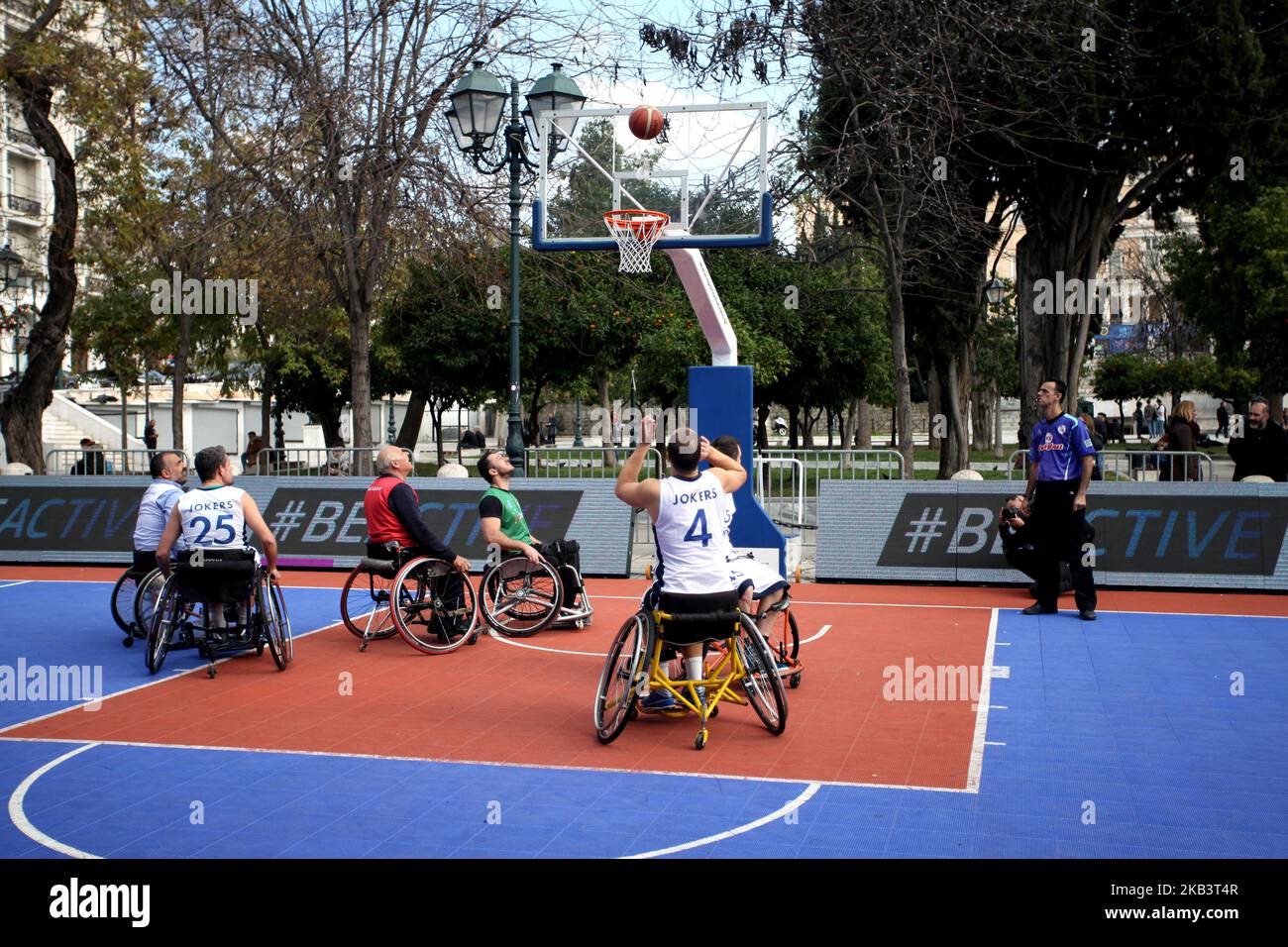 Wheelchair Basketball at Syntagma Square in Athens, Greece on December 3, 2018 on the occasion of the International Day for Persons with Disabilities. The unprofessional tournament was organised by the Hellenic Wheelchair Basketball Federation and gave people not physically disabled the opportunity to try the wheelchair and play basketball. (Photo by Giorgos Georgiou/NurPhoto) Stock Photo
