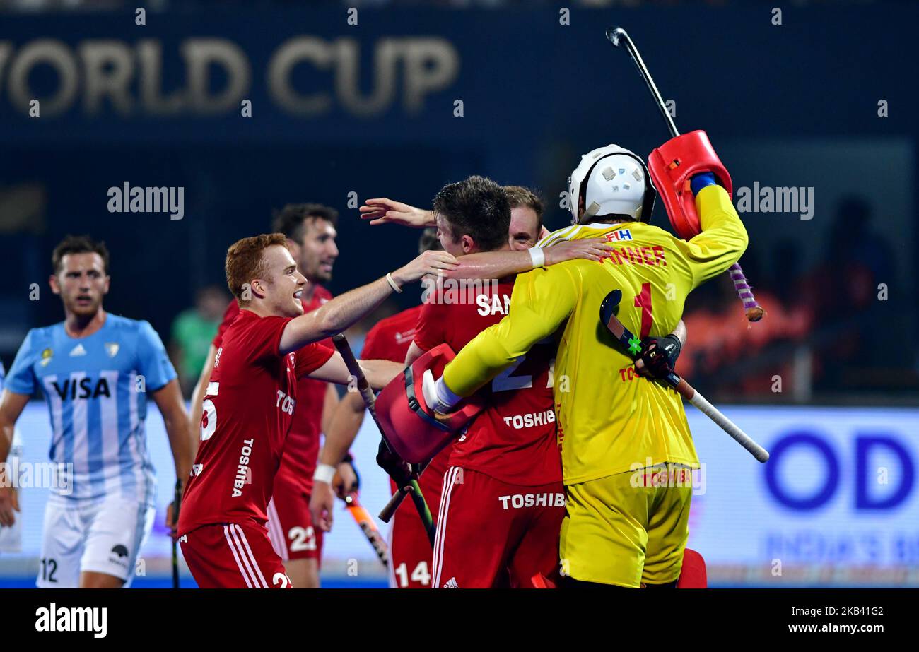 Goalkeeper George Pinner (yellow) celebrates victory at full time ...
