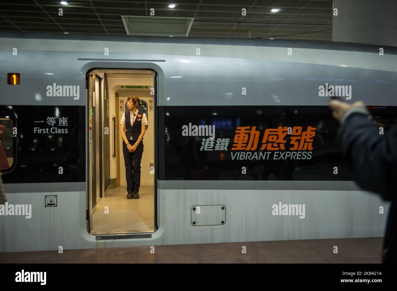 Vibrant Express train, operated by MTR Corp is shown inside Shenzhen North Station in Shenzhen, China. 13 December 2018. Today A Hong Kong court ruled that a controversial arrangement (co-location) which allows mainland Chinese officers to apply national laws at the city’s new cross-border rail terminus is legally sound, The Guangzhou-Shenzhen-Hong Kong Express Rail Link (XLR) which cost (US$10.8 billion ) went into operation on September 23.early this year. (Photo by Harry Wai/NurPhoto) Stock Photo