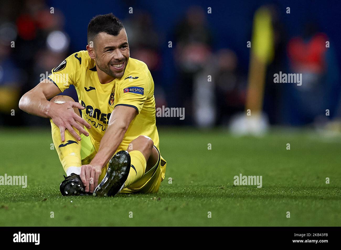 Javi Fuego of Villarreal lies injured on the pitch during the Group G match of the UEFA Europa League between Villarreal CF and Spartak Moskva at La Ceramica Stadium Villarreal, Spain on December 13, 2018. (Photo by Jose Breton/NurPhoto) Stock Photo