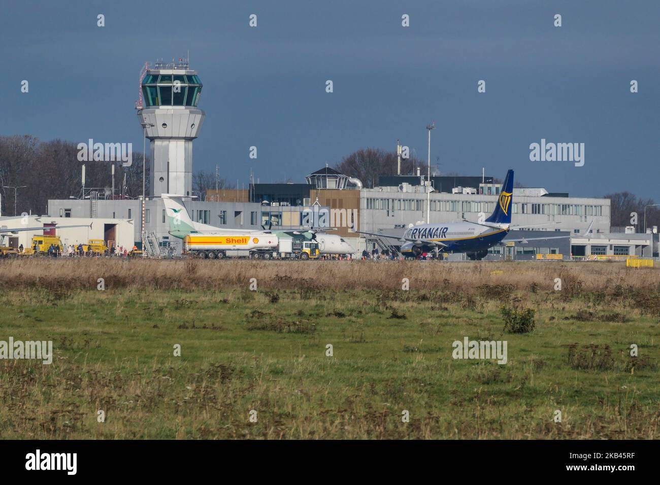 Ryanair low cost carrier Boeing 737-800 or 737-8AS(WL) with registration EI-EKL seen in Maastricht Aachen Airport MST / EHBK with the terminal building and the Control Tower. (Photo by Nicolas Economou/NurPhoto) Stock Photo