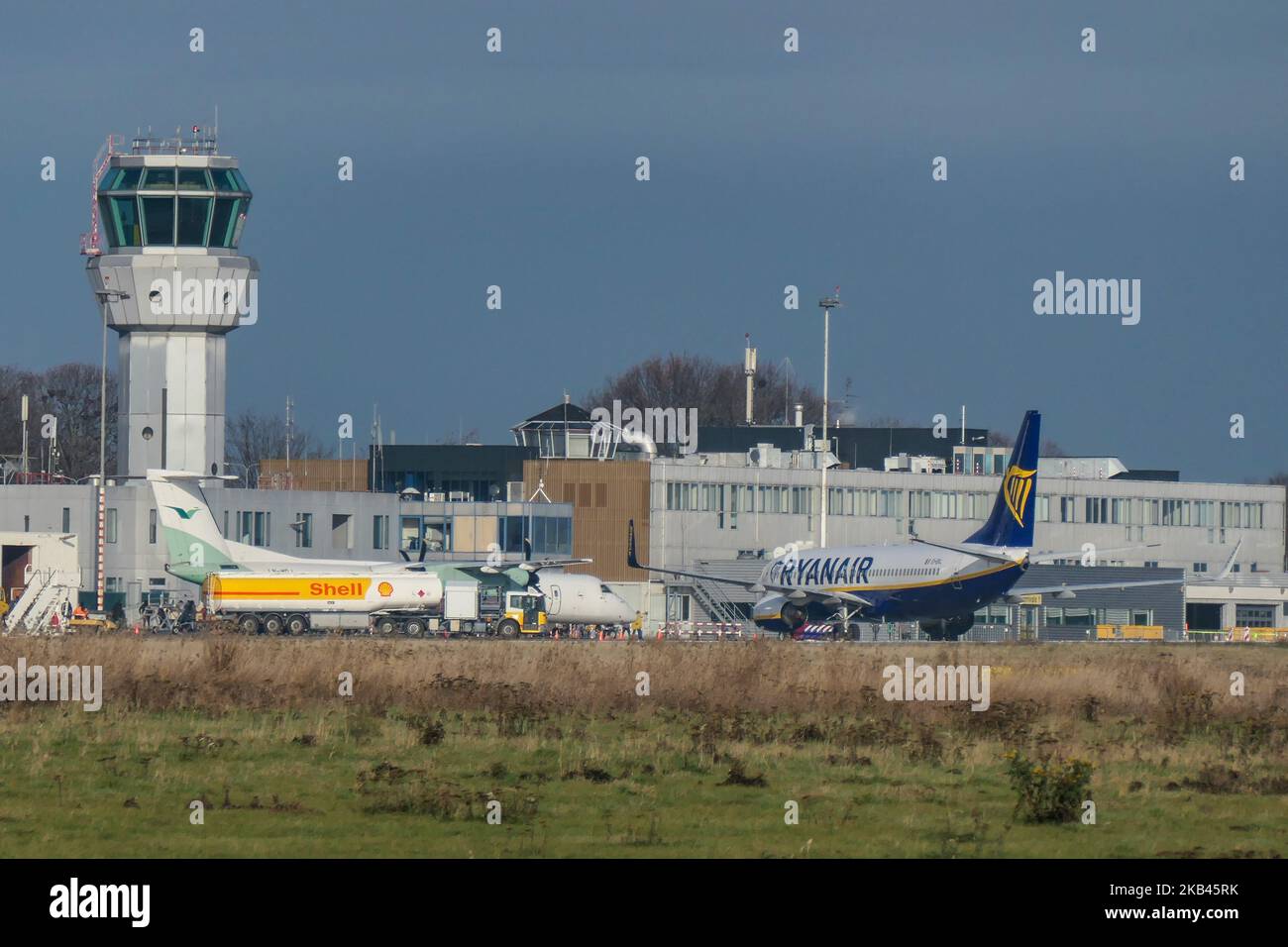 Ryanair low cost carrier Boeing 737-800 or 737-8AS(WL) with registration EI-EKL seen in Maastricht Aachen Airport MST / EHBK with the terminal building and the Control Tower. (Photo by Nicolas Economou/NurPhoto) Stock Photo