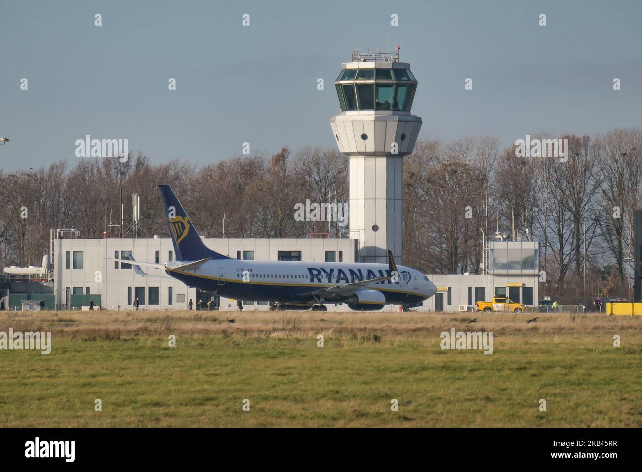 Ryanair low cost carrier Boeing 737-800 or 737-8AS(WL) with registration EI-EKL seen in Maastricht Aachen Airport MST / EHBK with the terminal building and the Control Tower. (Photo by Nicolas Economou/NurPhoto) Stock Photo