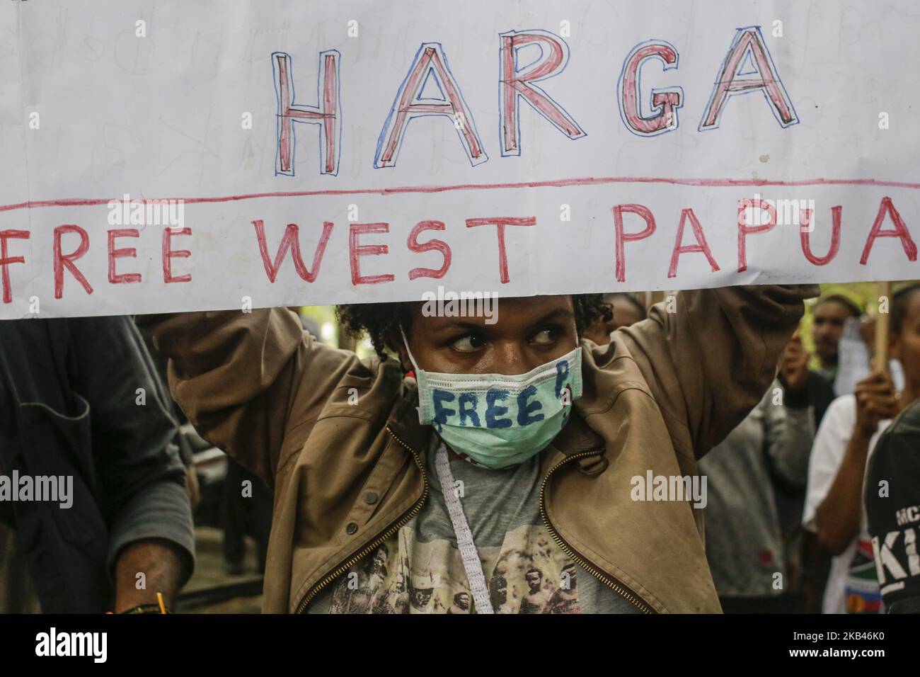An West Papuan activist hold banners during a rally in Denpasar, Bali, Indonesia on December 19 2018. Dozens of activists urges Indonesian government along with its military to drive off from their land and demanding independence of West Papua. (Photo by Johanes Christo/NurPhoto) Stock Photo