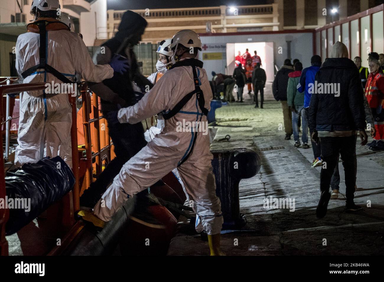 A group of rescued migrants being transferred to the Care Unit where the REd Cross staffs attended to them. 18-12-2018, Malaga, Spain. (Photo by Guillaume Pinon/NurPhoto) Stock Photo