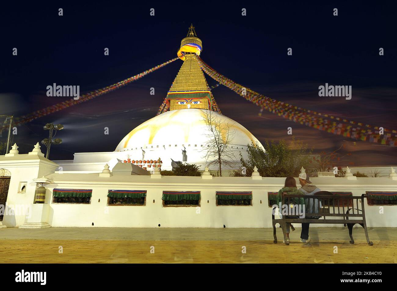 Nepalese devotees offering rituals and kora around the Boudhanath Stupa