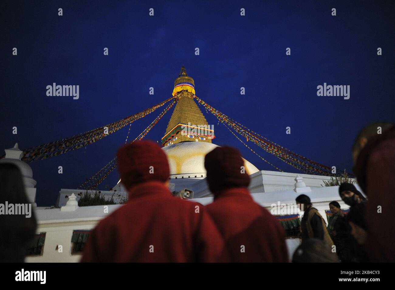 Nepalese devotees offering rituals and kora around the Boudhanath Stupa