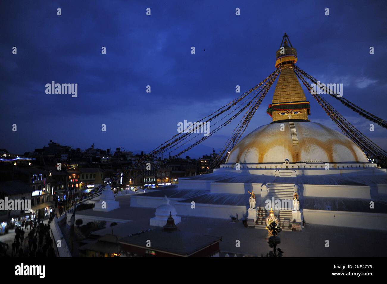 Nepalese devotees offering rituals and kora around the Boudhanath Stupa