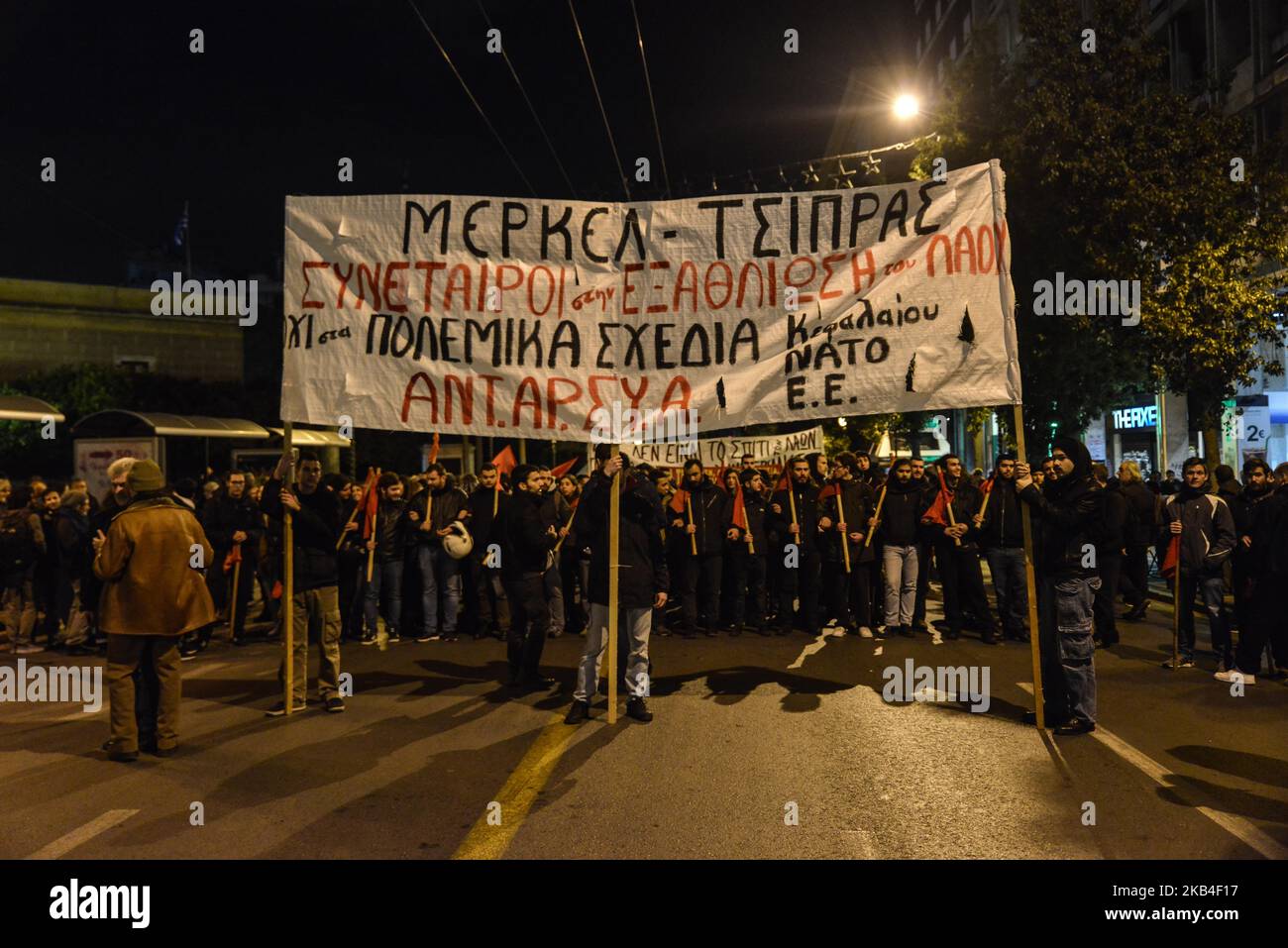 Protesters clash with riot police during a demonstration against the visit of German Chancellor Angela Merkel in Athens, Greece on January 10, 2018. (Photo by Dimitris Lampropoulos/NurPhoto) Stock Photo