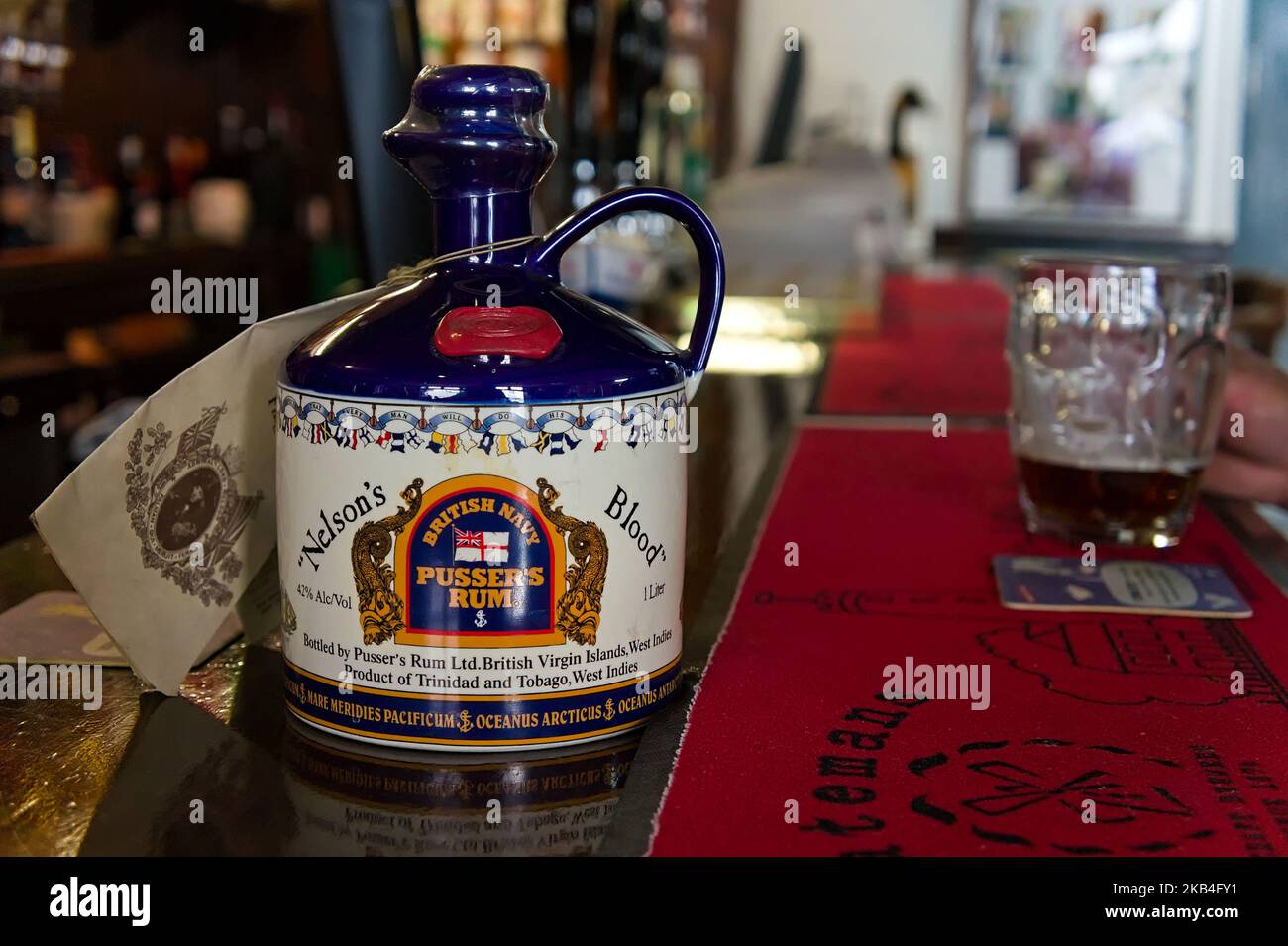 British Pusser's Rum jug at the bar in the pub. Stock Photo