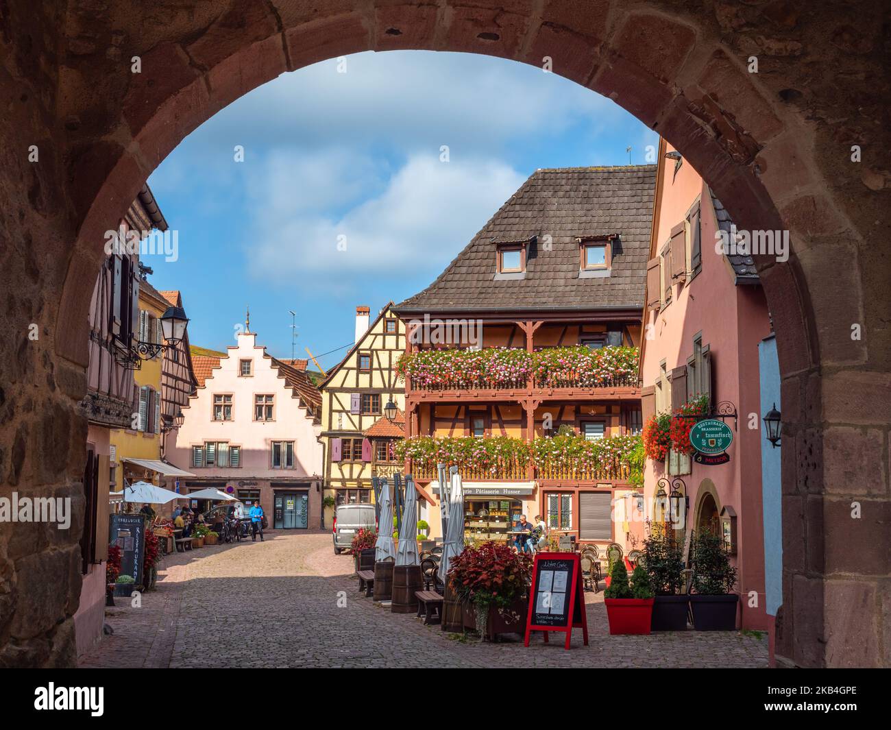 Turckheim, France - October 12, 2022: View through the city gates to the old medieval town of Turckheim in Alsace. Stock Photo