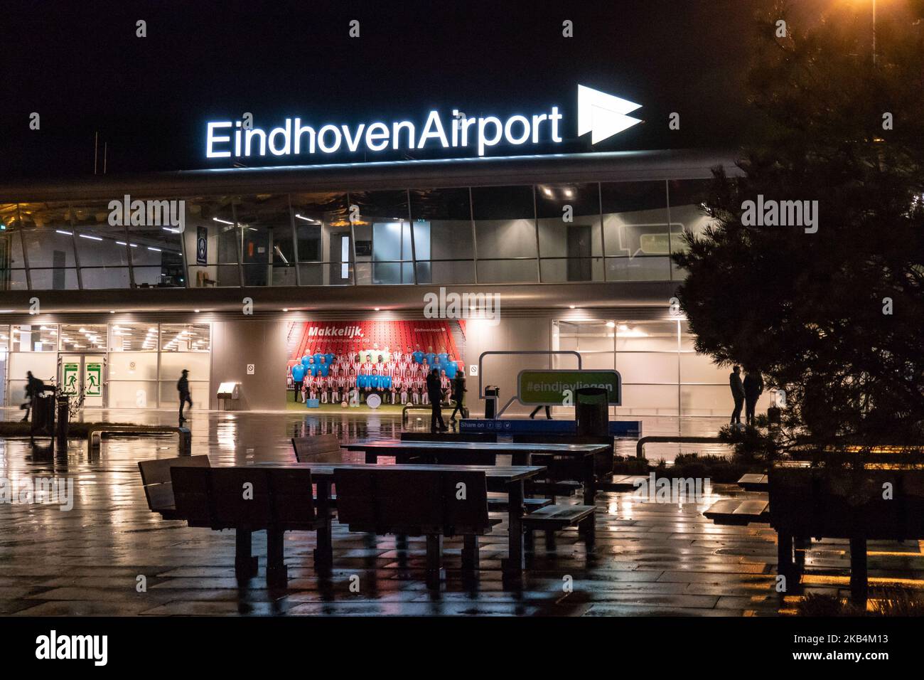 Night view of the Terminal, the main hall and the hotel of Eindhoven Airport EHEH / EIN in the Netherlands. Eindhoven is the second largest airport in the Netherlands and is a hub for Transavia, Wizz Air and Ryanair. The airport is Public and Military. (Photo by Nicolas Economou/NurPhoto) Stock Photo