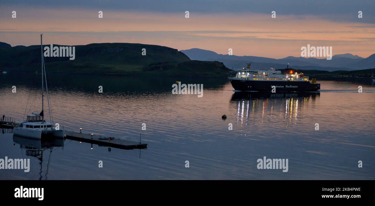 Isle of Mull Car Ferry arriving Oban from Craignure Mull in the evening twilight Stock Photo