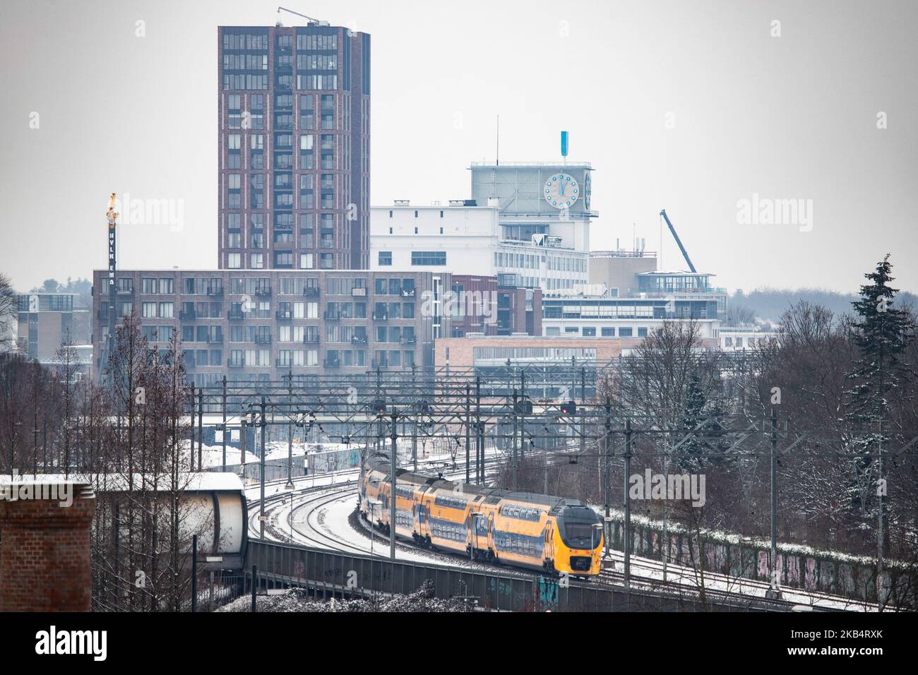 Trains in the snow. Snow in Eindhoven city on January 23, 2019 after the snowfall of 22 January, in the Netherlands. (Photo by Nicolas Economou/NurPhoto) Stock Photo