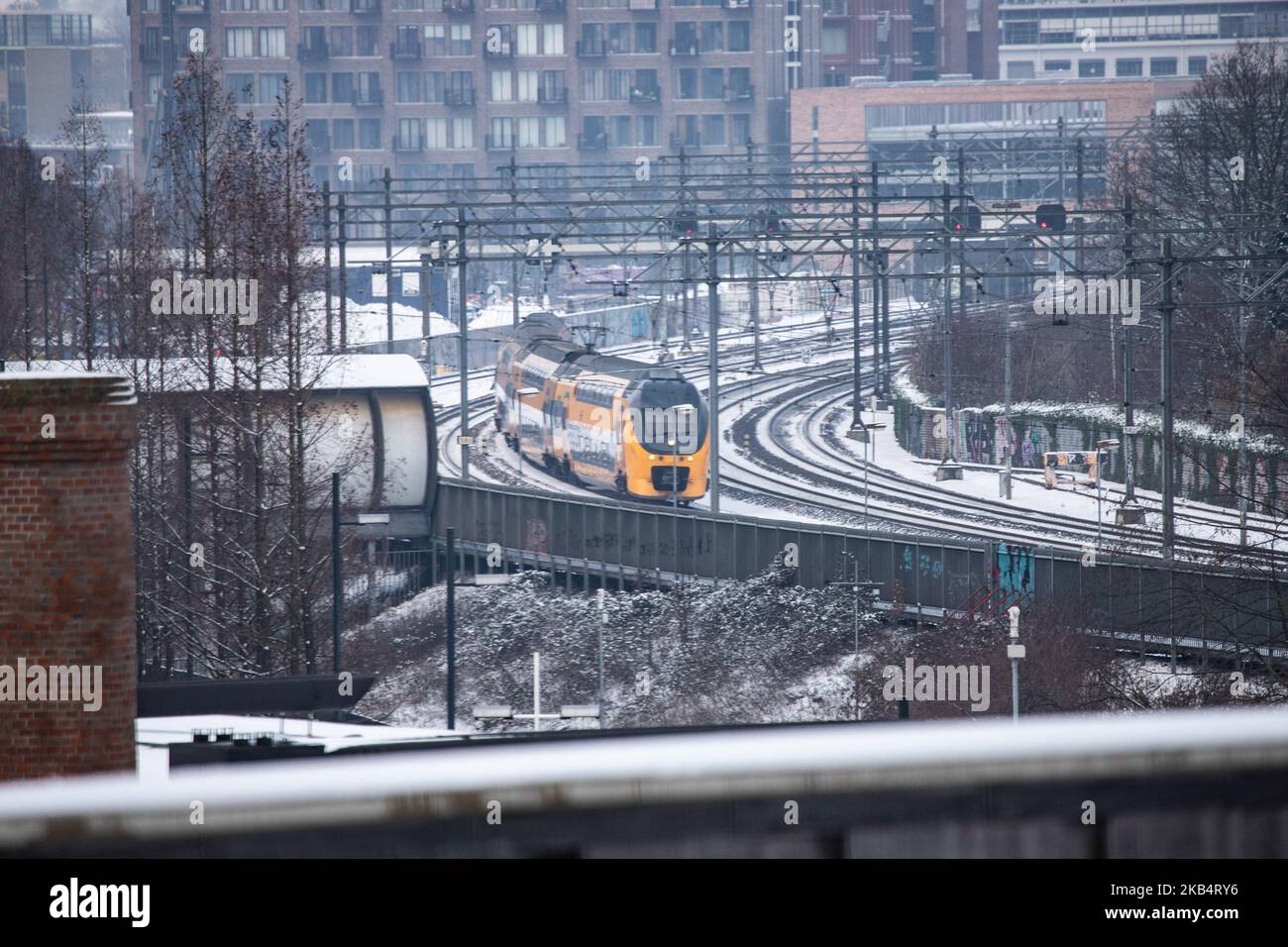 Trains in the snow. Snow in Eindhoven city on January 23, 2019 after the snowfall of 22 January, in the Netherlands. (Photo by Nicolas Economou/NurPhoto) Stock Photo