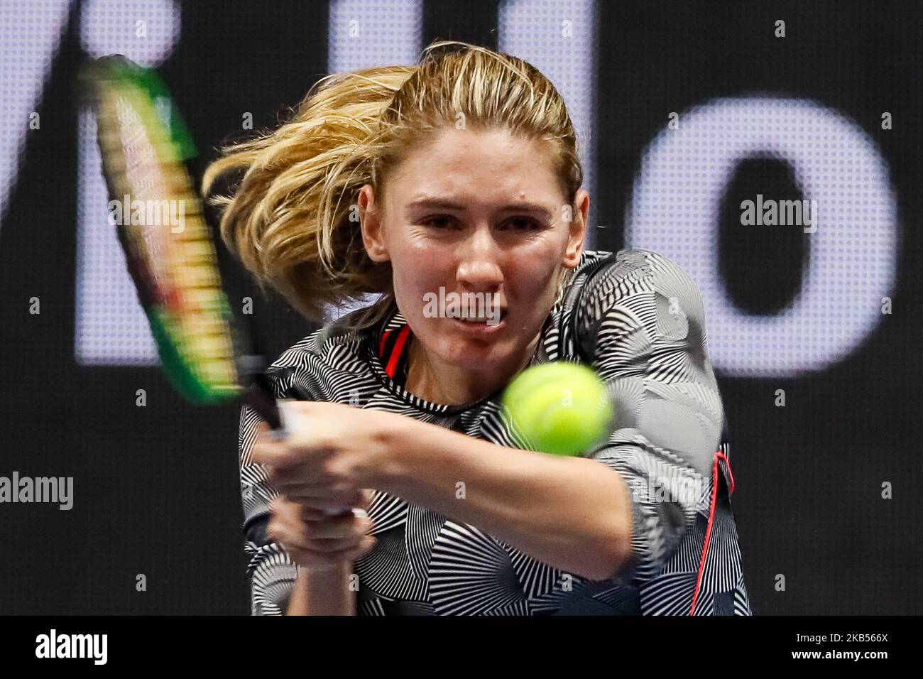 Ekaterina Alexandrova of Russia returns the ball to Aryna Sabalenka of