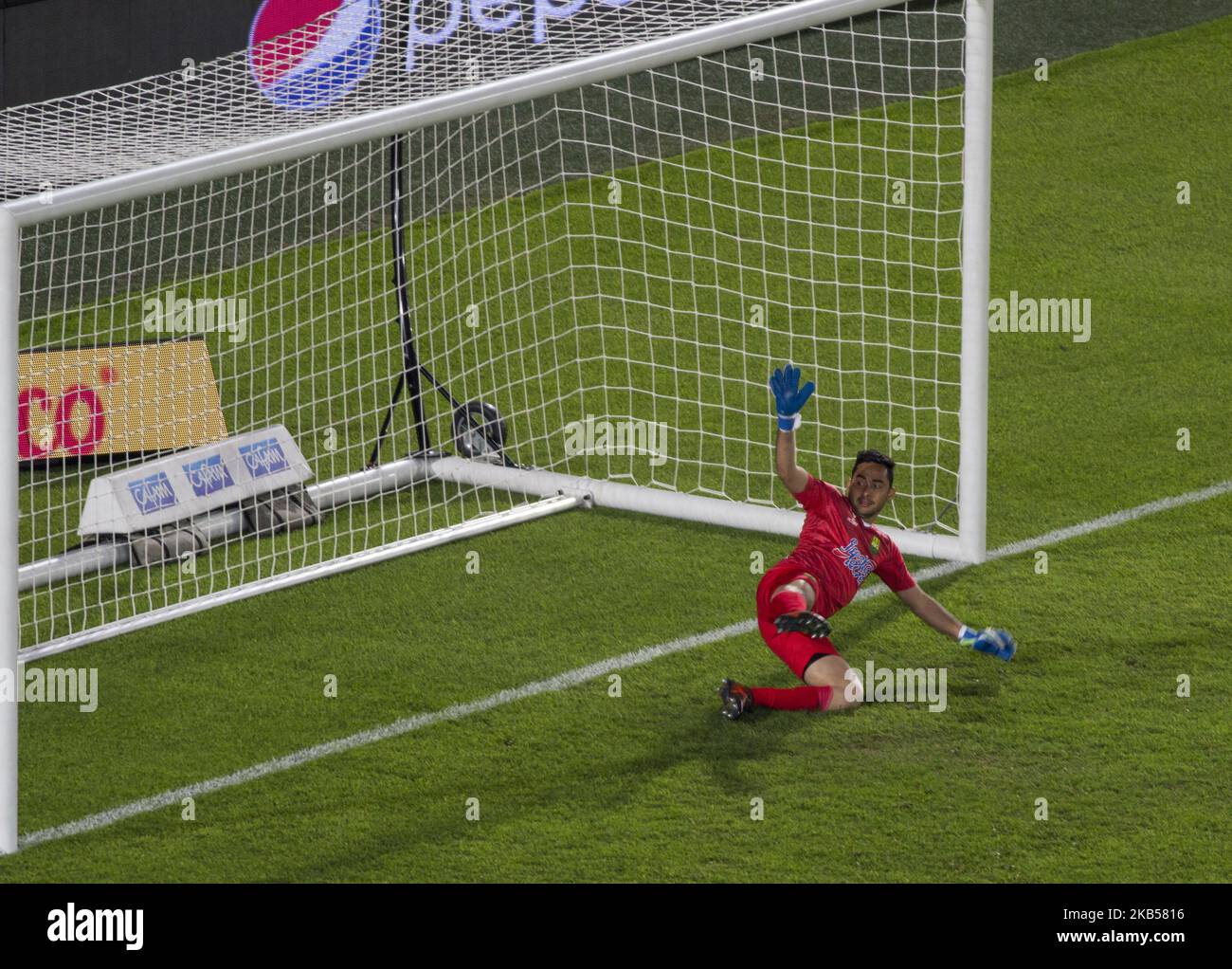 James Aguirre goalkeeper of Atletico Bucaramanga tries to cover the penalty shot during Primera A Colombia football match between Millonarios and Atletico Bucaramanga at Stadium Nemesio Camacho in Bogota, Colombia, on 3 February 2019. (Photo by Daniel Garzon Herazo/NurPhoto) Stock Photo
