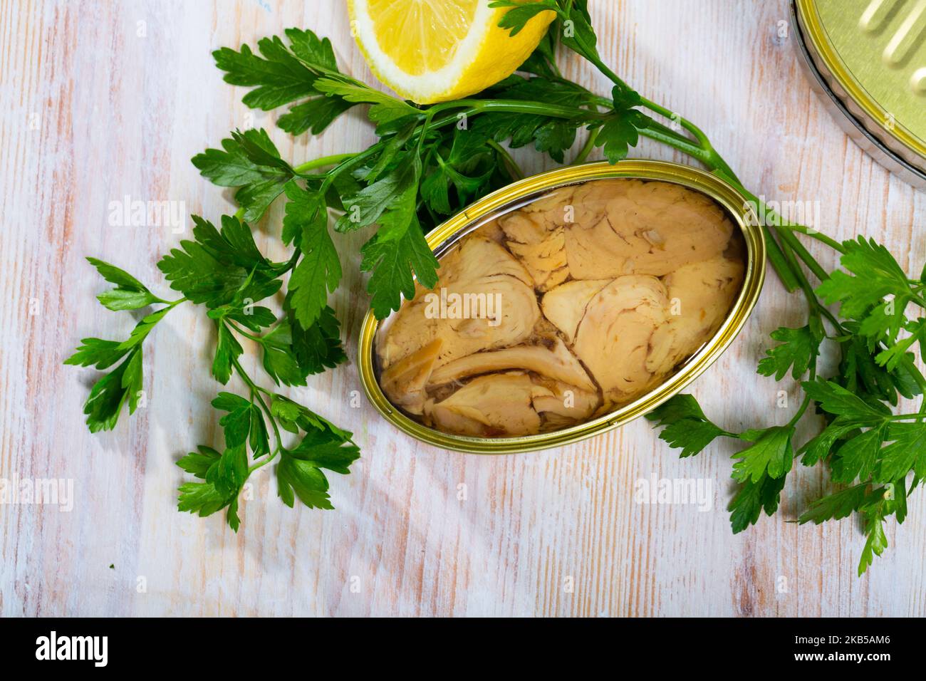 Open tin can of tuna in oil Stock Photo Alamy
