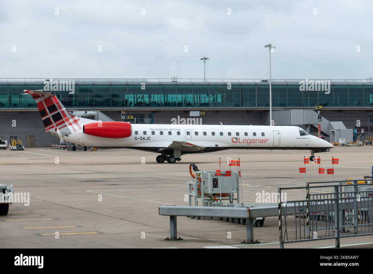 Loganair Embraer ERJ-145 aircraft as seen taxiing at London Stansted International Airport STN EGSS in England, UK on 1st August 2019. The regional jet airplane has registration G-SAJC and is flying since June 2000, for British Midland, then bmi Regional until Dec. 2018. Loganair Scotland's Airline LM LOG has a base at Glasgow. The carrier connects the British capital to Derry and Dundee. (Photo by Nicolas Economou/NurPhoto) Stock Photo