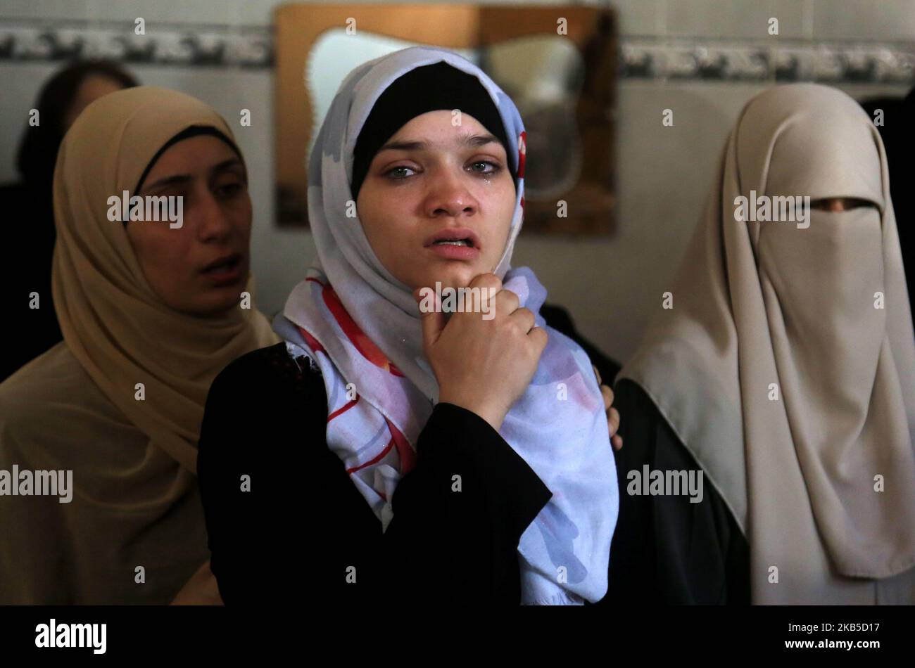 Khaled Rabi Relatives of Palestinian teenager Khaled al-Rabie, 14, one of two ...