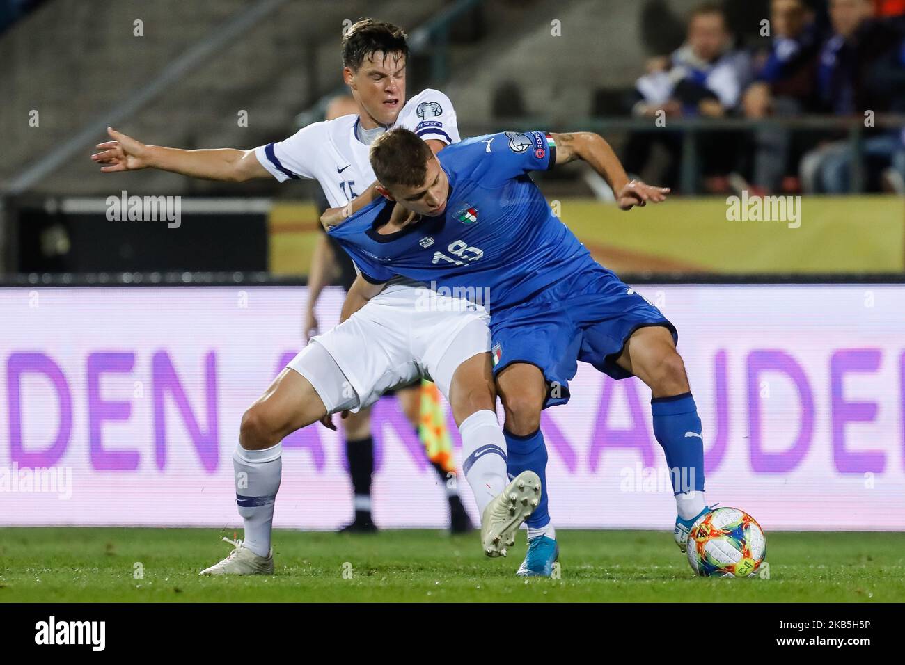 Sauli Vaisanen (L) of Finland and Nicolo Barella of Italy vie for the ball during UEFA Euro 2020 qualifying match between Finland and Italy on September 8, 2019 at Ratina Stadium in Tampere, Finland. (Photo by Mike Kireev/NurPhoto) Stock Photo