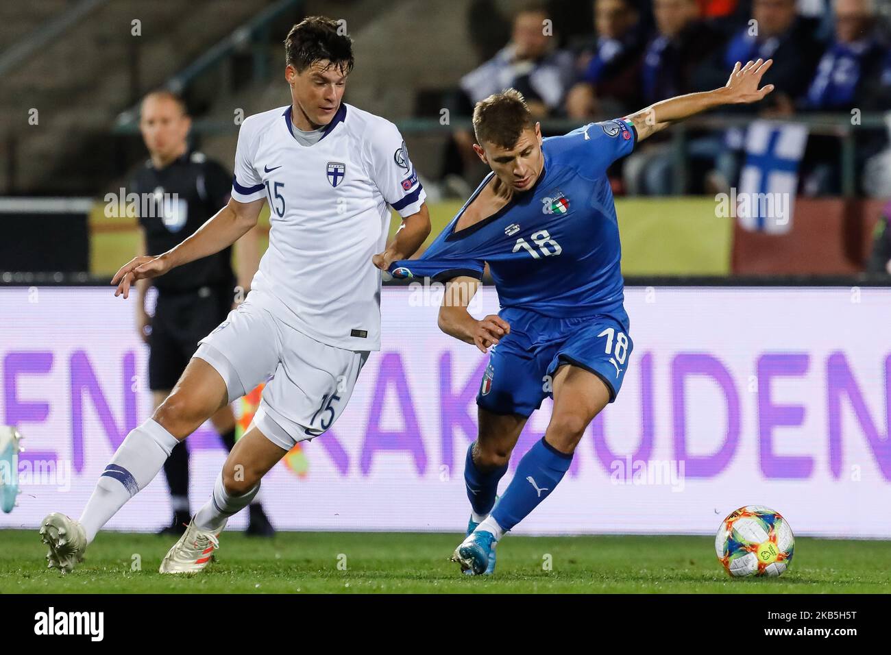 Sauli Vaisanen (L) of Finland and Nicolo Barella of Italy vie for the ball during UEFA Euro 2020 qualifying match between Finland and Italy on September 8, 2019 at Ratina Stadium in Tampere, Finland. (Photo by Mike Kireev/NurPhoto) Stock Photo