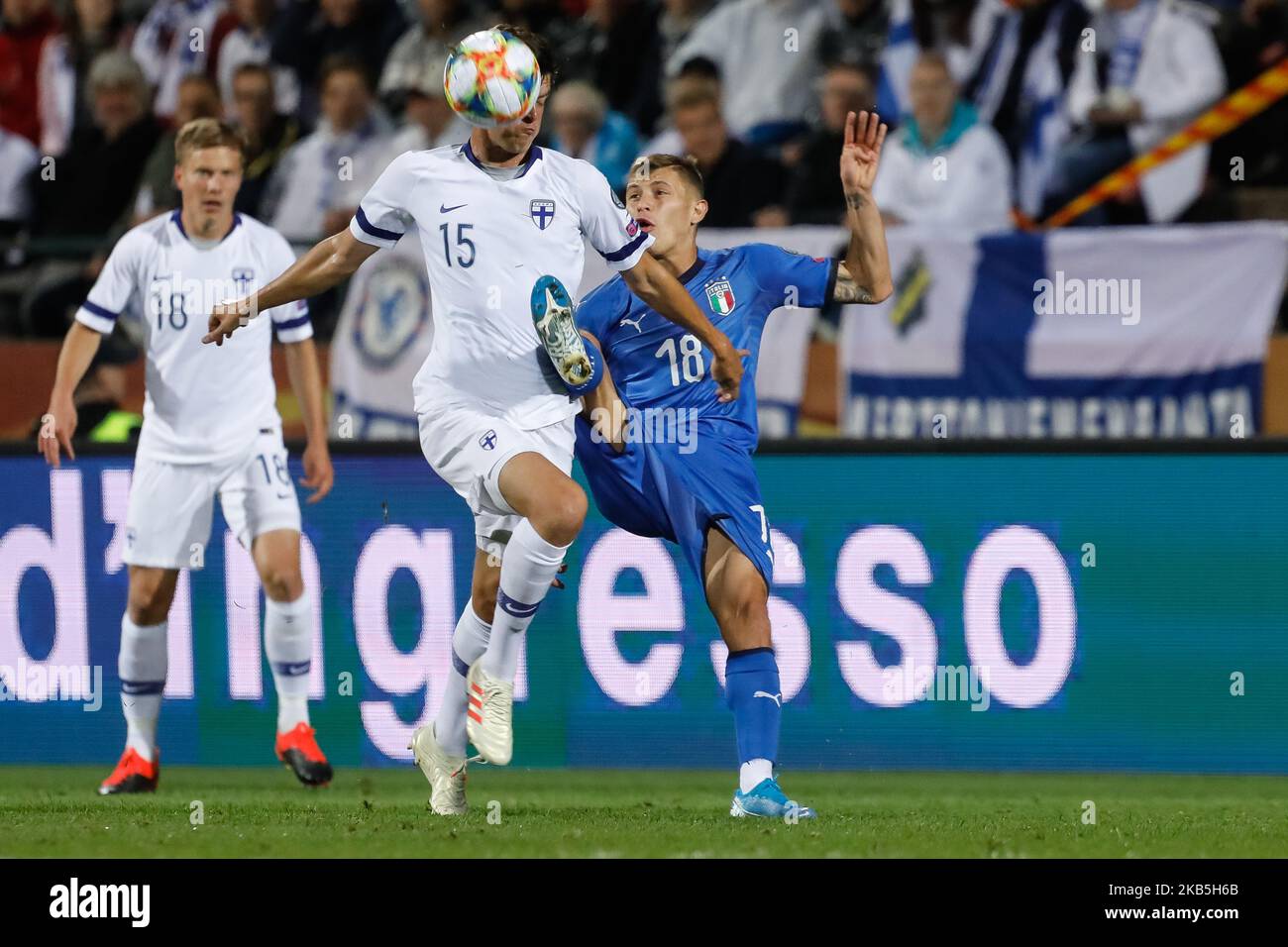 Sauli Vaisanen (N15) of Finland and Nicolo Barella of Italy vie for the ball during UEFA Euro 2020 qualifying match between Finland and Italy on September 8, 2019 at Ratina Stadium in Tampere, Finland. (Photo by Mike Kireev/NurPhoto) Stock Photo