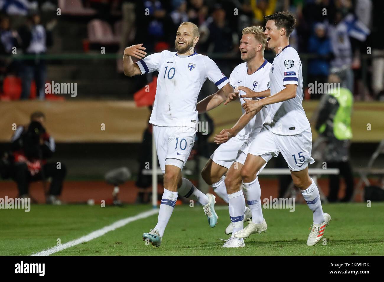 Teemu Pukki (L) of Finland celebrates his goal with Paulus Arajuuri and Sauli Vaisanen (R) during UEFA Euro 2020 qualifying match between Finland and Italy on September 8, 2019 at Ratina Stadium in Tampere, Finland. (Photo by Mike Kireev/NurPhoto) Stock Photo
