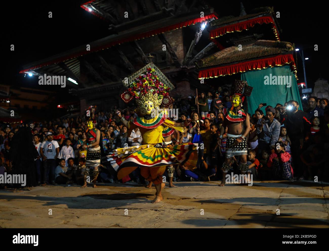Nepalese mask dancer performs traditional Mahakali dance during the second day of Indra Jatra festival at the premises of Hanuman Dhoka Durbar Square in Kathmandu, Nepal on September 11, 2019. The eight-day long Indra Jatra festival falls in September and is one of the most exciting and revered festivals of the Newar community of the Kathmandu Valley. (Photo by Saroj Baizu/NurPhoto) Stock Photo
