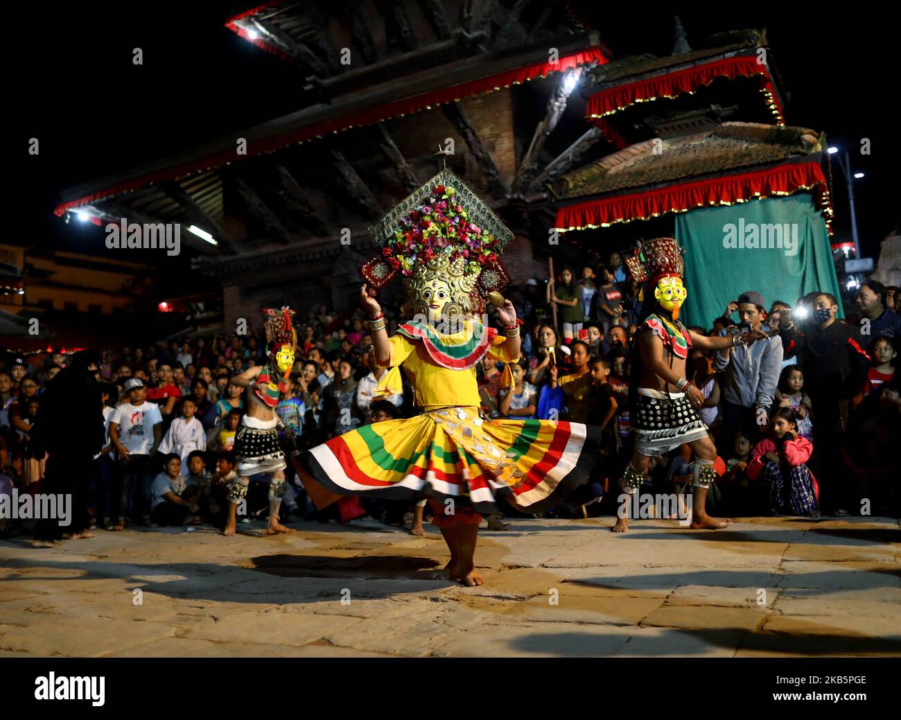 Nepalese mask dancer performs traditional Mahakali dance during the second day of Indra Jatra festival at the premises of Hanuman Dhoka Durbar Square in Kathmandu, Nepal on September 11, 2019. The eight-day long Indra Jatra festival falls in September and is one of the most exciting and revered festivals of the Newar community of the Kathmandu Valley. (Photo by Saroj Baizu/NurPhoto) Stock Photo