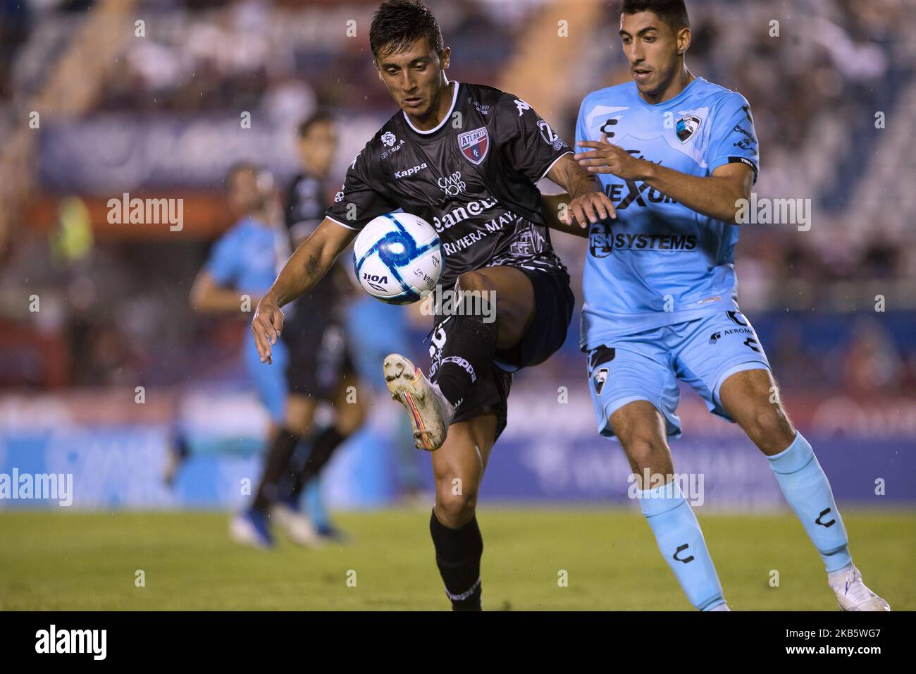Omar Islas of Atlante #24 and Carlos Alberto Zamora of Tampico Madero #6 in action during a match between Tampico Madero and Atlante FC as part of BBVA MX Ascent League at Andres Quinta Roo Stadium on September 12, 2019 in Cancun, Mexico (Photo by Eyepix/NurPhoto) Stock Photo