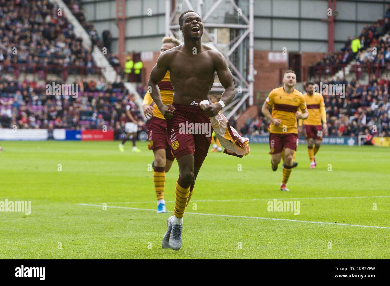 Sherwin Seedorf of Motherwell celebrates scoring his team's second goal during the Scottish Premier League match between Hearts and Motherwell at Tynecastle park on 14 September, 2019 in Edinburgh, Scotland. (Photo by Ewan Bootman/NurPhoto) Stock Photo