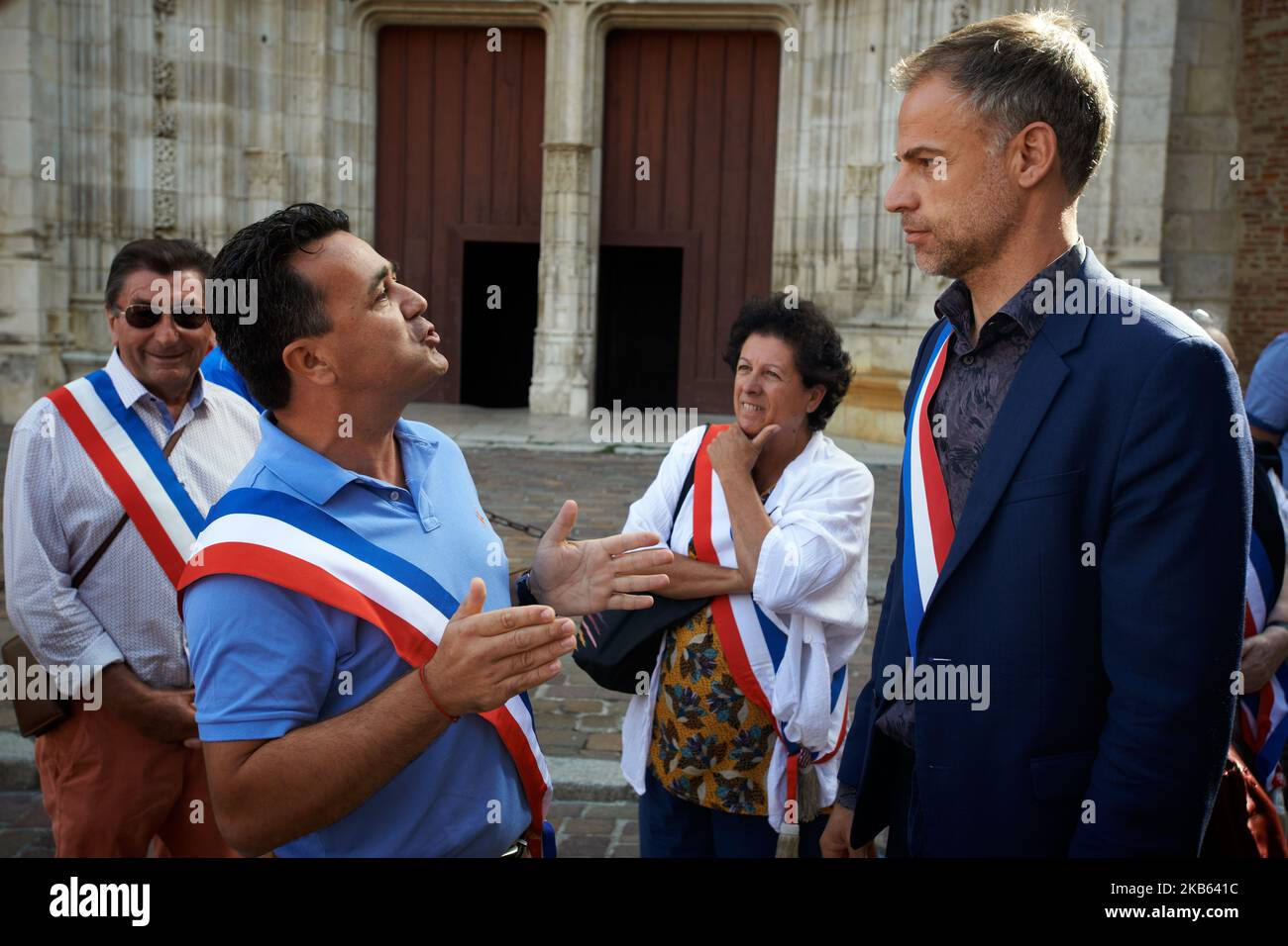 A mayor argues with congressman Sebastion Nadot. Civil servants from the DGFIP (General Directorate of Public Finance) and mayors gathered in front of the Prefecture of Haute-Garonne to protest against the Darmanin's plan to close down tax offices across France. Darmaninis the finance minister. In the Haute-Garonne department, 25 tax offices will be closd and in the Lot-et-Garonne department, for example, all tax offices will be closed before 2023. Toulouse. France. September 16th 2019. (Photo by Alain Pitton/NurPhoto) Stock Photo