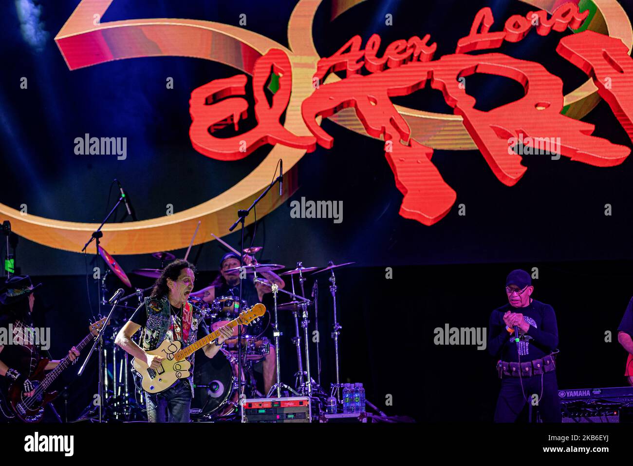 Alex Lora leader of Mexican band 'El Tri' performs a show on stage as part of celebrating the 50 anniversary of El Tri at Autodromo of Cancun on September 20, 2019 in Cancun, Mexico (Photo by Eyepix/NurPhoto) Stock Photo