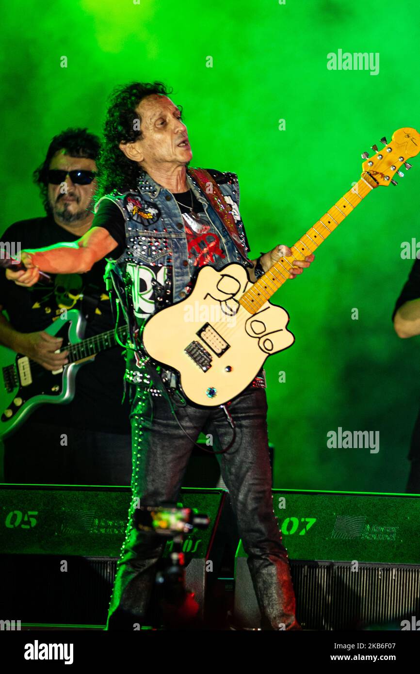 Alex Lora leader of Mexican band 'El Tri' performs a show on stage as part of celebrating the 50 anniversary of El Tri at Autodromo of Cancun on September 20, 2019 in Cancun, Mexico (Photo by Eyepix/NurPhoto) Stock Photo