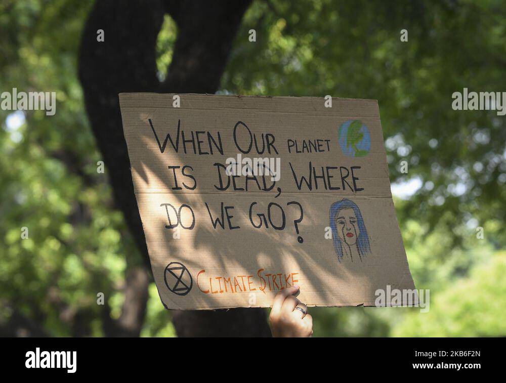 Students and activists hold placards as they participate in a Global Climate Strike rally organised by 'Fridays for Future' in New Delhi, India on September 20, 2019. (Photo by Indraneel Chowdhury/NurPhoto) Stock Photo