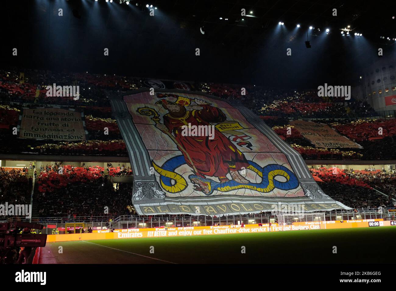 AC Milan fans unfold a giant tifo during the Serie A match between AC Milan and FC Internazionale at Stadio Giuseppe Meazza on September 21, 2019 in Milan, Italy. (Photo by Giuseppe Cottini/NurPhoto) Stock Photo