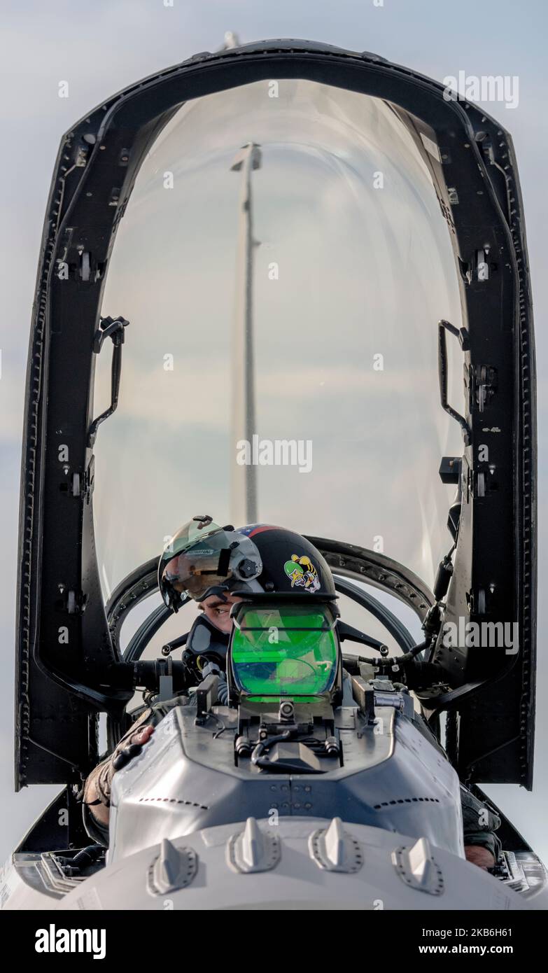 U.S. Air Force Maj. Elliott England, an F-16 fighter pilot assigned to the Ohio National Guard's 180th Fighter Wing, starts a U.S. Air Force F-16 Fighting Falcon, assigned to the 180FW, before a training flight at Naval Air Station Key West, Florida, Nov. 2, 2022. The 180FW deployed to Key West to train with VFC-111, the Navy's premier adversary squadron, providing realistic training scenarios that ensure the 180FW is prepared for homeland defense and contingency operations around the globe.  (U.S. Air National Guard photo by Staff Sgt. Kregg York) Stock Photo