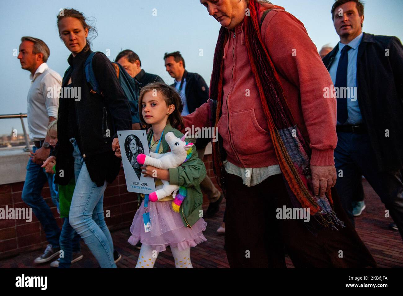 This year, 75 years after Operation Market Garden, the Dutch city of Nijmegen celebrate 75 Years of freedom, in Nijmegen, Netherlands, on September 21, 2019. During this Sunset March, they gave special attention to the 48 allied soldiers who died 75 years ago during the heroic crossing of the Waal river. 48 light towers turned on and at the same time, 48 light rays illuminated the sky. This tribute to them was supported by an opera spectacle from the water. The Sunset March ends at the Waalcrossing monument, where people could leave flowers. (Photo by Romy Arroyo Fernandez/NurPhoto) Stock Photo