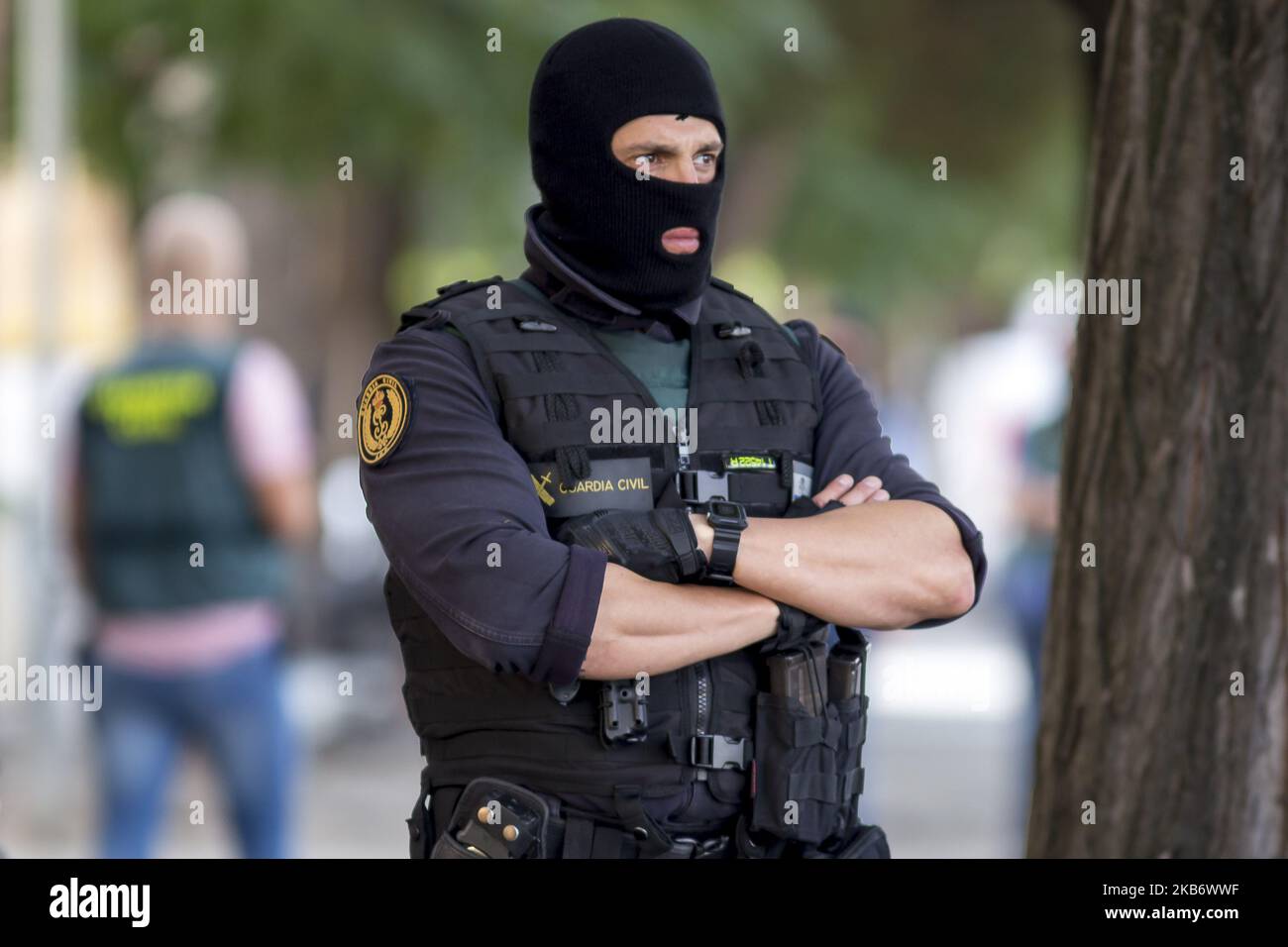 Masked members of the Guardia Civil (spanish militarized police) arrested activists of the pro Catalonia's independence CDR (Defense Committees of the Republic) accused of terrorism by the Spanish National High Court, in Sabadell, near Barcelona, Catalonia, Spain, on September 23, 2019 (Photo by Miquel Llop/NurPhoto) Stock Photo