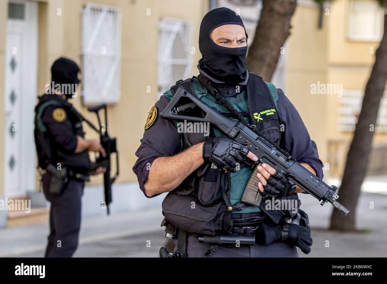 Masked members of the Guardia Civil (spanish militarized police) arrested activists of the pro Catalonia's independence CDR (Defense Committees of the Republic) accused of terrorism by the Spanish National High Court, in Sabadell, near Barcelona, Catalonia, Spain, on September 23, 2019 (Photo by Miquel Llop/NurPhoto) Stock Photo