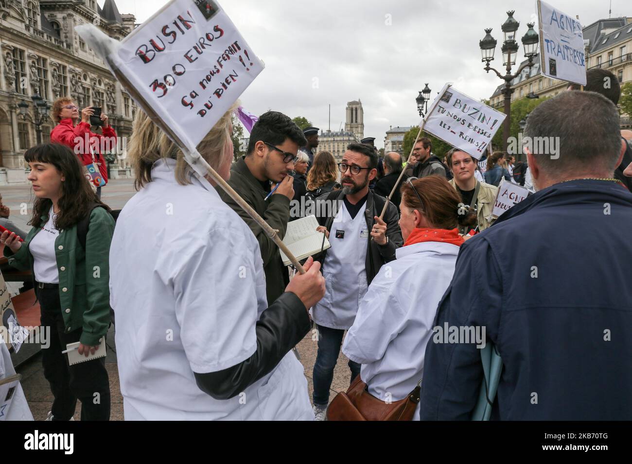 Doctors, nurses and cargivers gather in Paris in front the Hotel de Ville, outside the headquarter of Assistance publique and Hôpitaux de Paris or AP-HP, public hospital system of Paris, to improve the working conditions in the French emergencies services, on September 26, 2019. Emergency hospital staff in France are continuing to strike, with almost half of services affected five months in to the movement. (Photo by Michel Stoupak/NurPhoto) Stock Photo