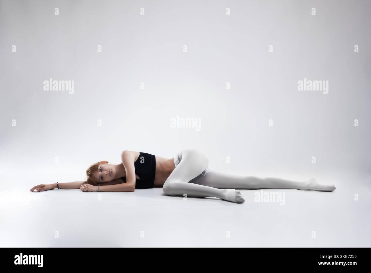 Ballet girl lying on floor hi-res stock photography and images - Alamy