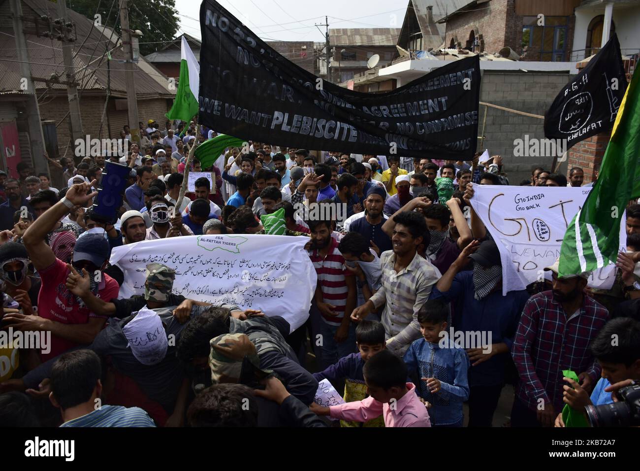 Kashmiri people shout pro-freedom slogans during protests after friday ...
