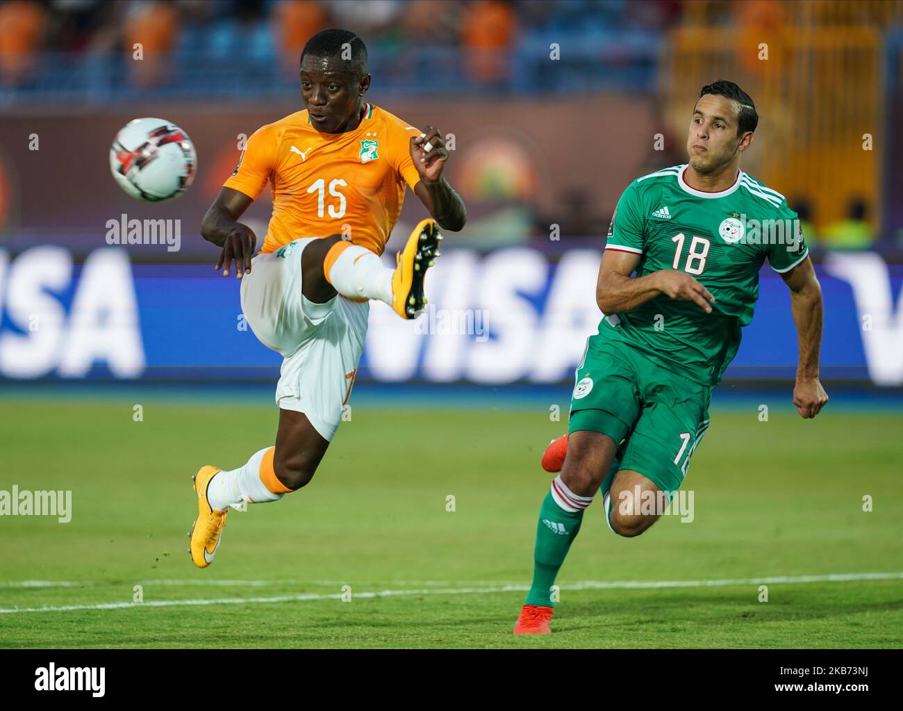 Max Alain Gradel of Cote D’ivoire and Mehdi Embareck Zeffane of Algeria during the 2019 African Cup of Nations match between Ivory coast and Algeria at the Suez Stadium in Suez, Egypt on July 11,2019. (Photo by Ulrik Pedersen/NurPhoto) Stock Photo