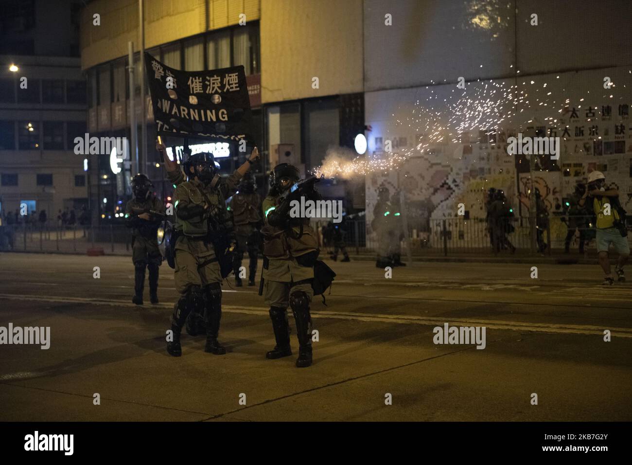 Police are seen firing tear gas smoke in Tai Koo in Hong Kong on October 3, 2019, Pro- Democracy Protester Have Been Protesting across Hong Kong for the past few months calling for the government to meet their demands including setting up an independent inquiry into police misconduct and abuse of power over the past few months of protest in Hong Kong, Also calling for universal Suffrage (Photo by Vernon Yuen/NurPhoto) Stock Photo
