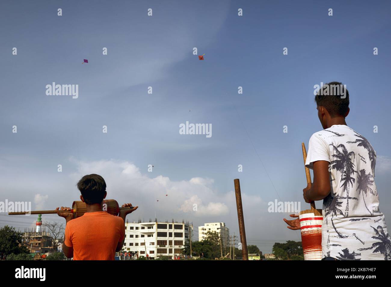 Boys fly kite in the bank of the polluted Buriganga River in Dhaka Bangladesh on October 4, 2019. (Photo by Kazi Salahuddin Razu/NurPhoto) Stock Photo